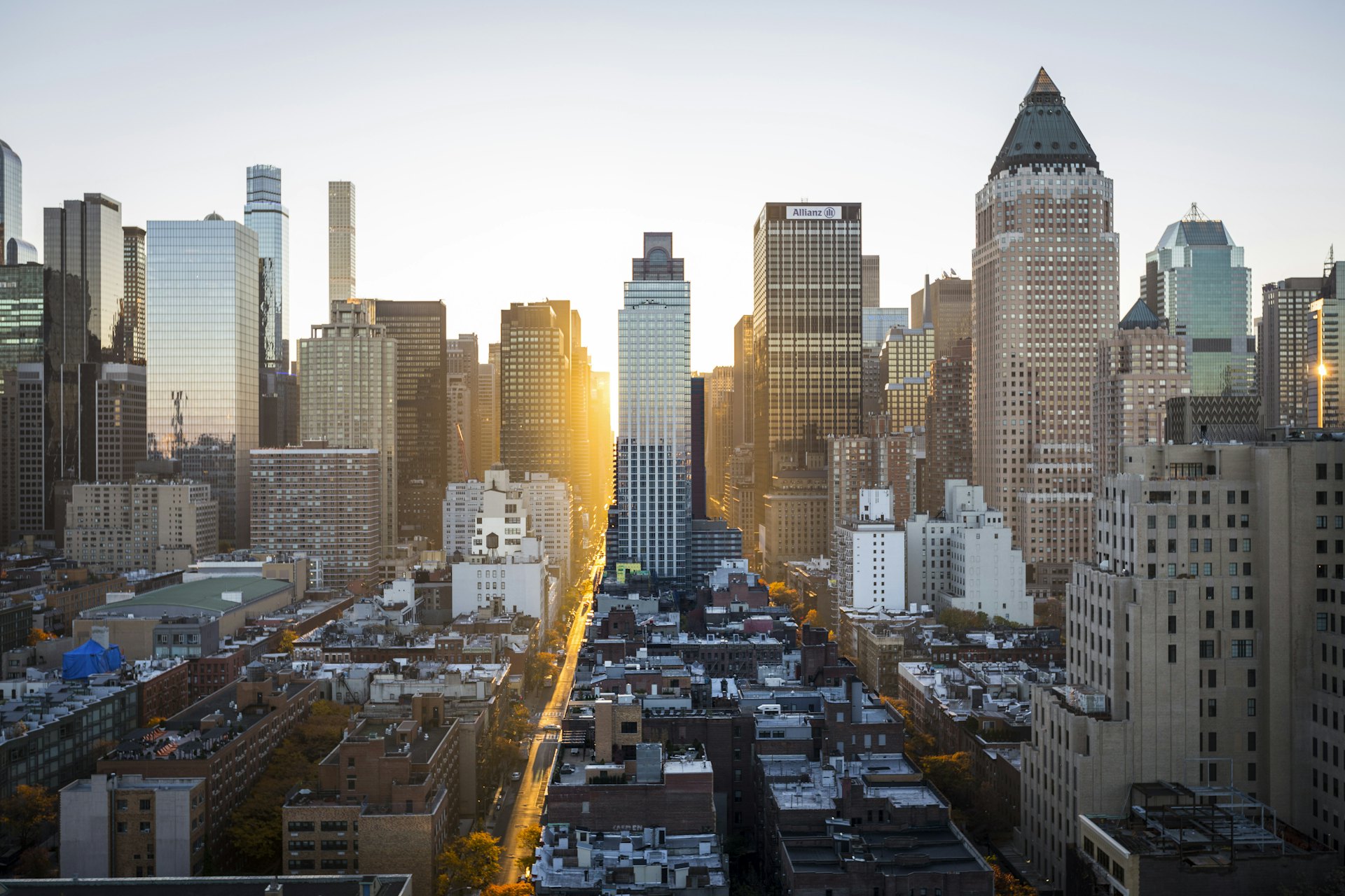 Downtown avenue between towers at golden hour